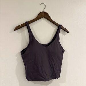 Purple cropped sports tank, with built in bra/padding.